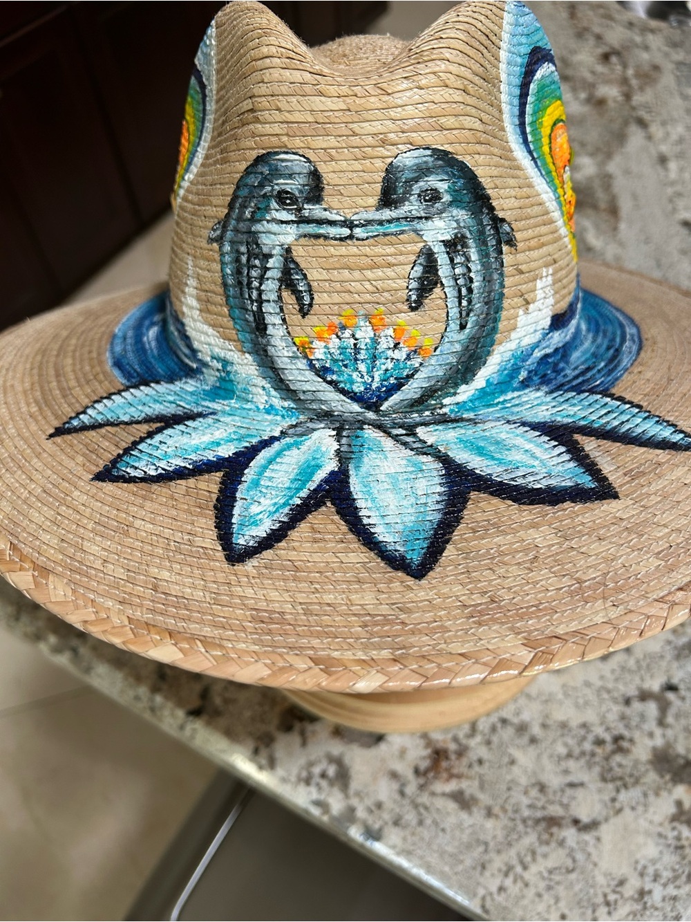 Custom one-of-a-kind hand-painted straw hat with Dolphin & Lotus Design.